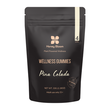 Pina Colada flavored Honey Bloom Level 4 Wellness Gummies in a black package promoting plant-powered wellness for adults 21+.